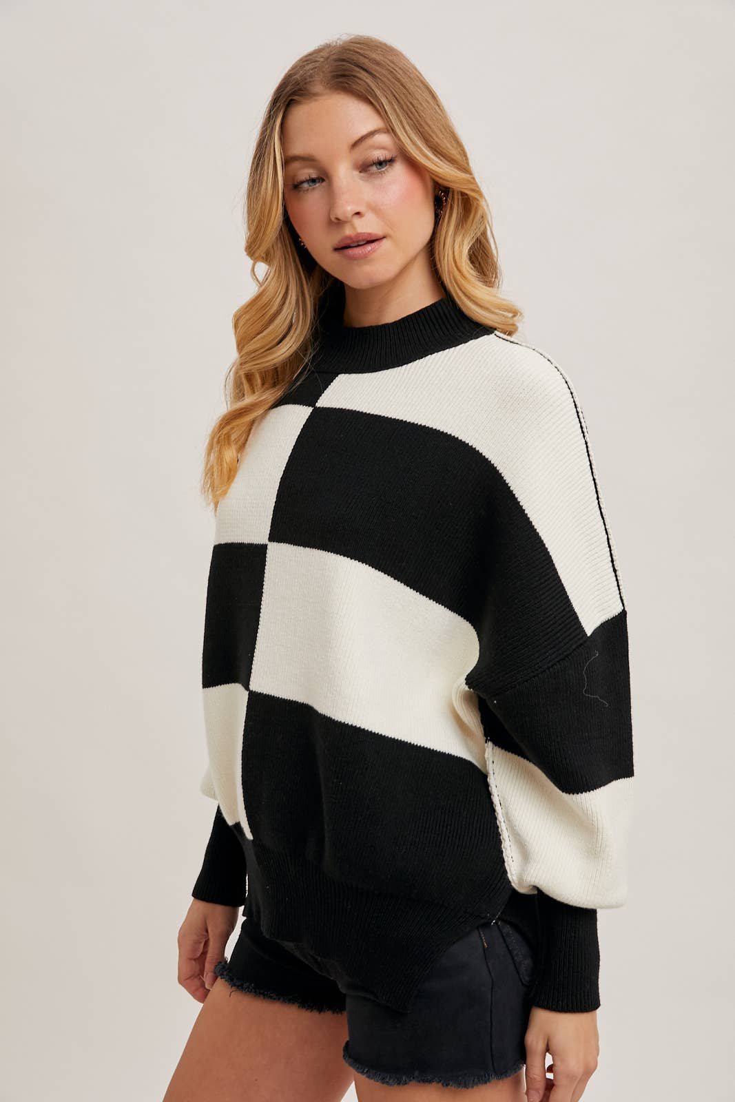 CHECKMATE KNIT SWEATER