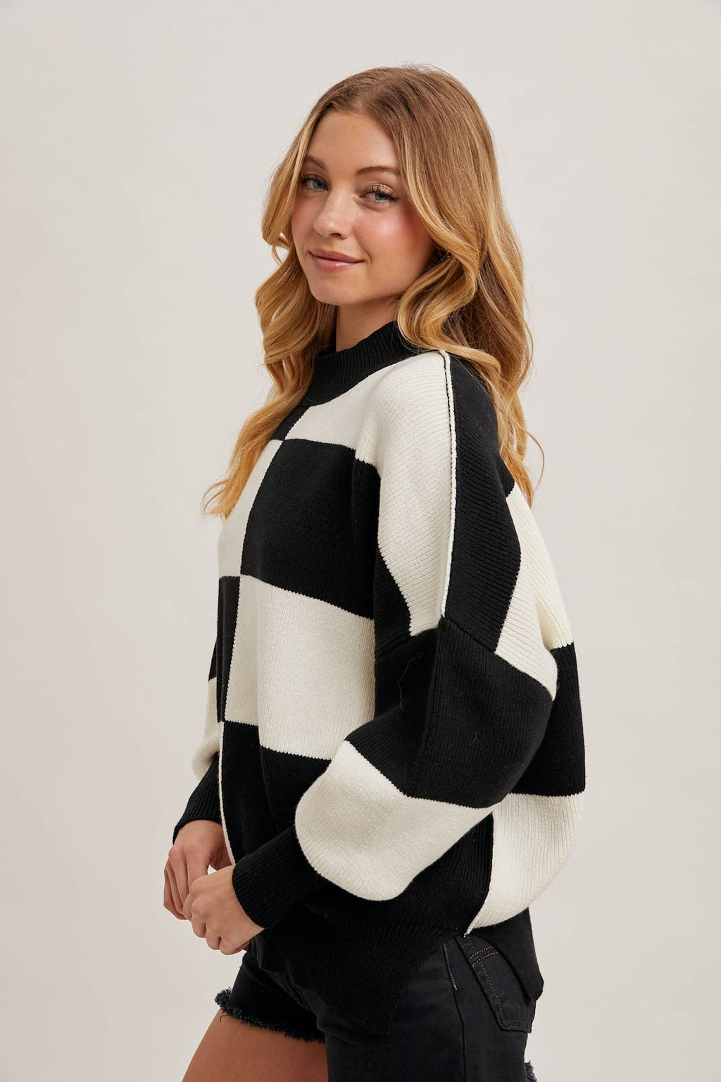 CHECKMATE KNIT SWEATER