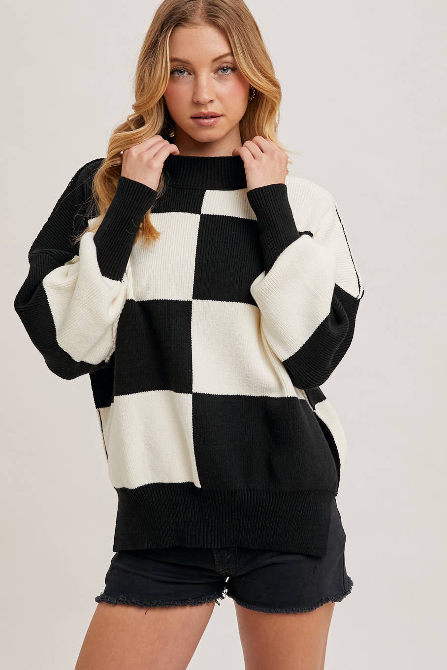 CHECKMATE KNIT SWEATER