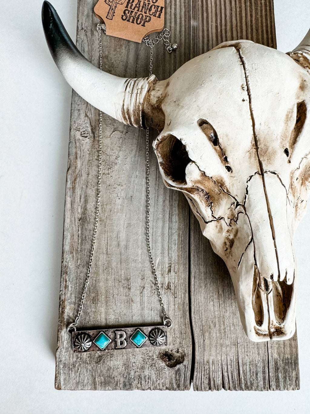 INITIAL CONCHO BAR