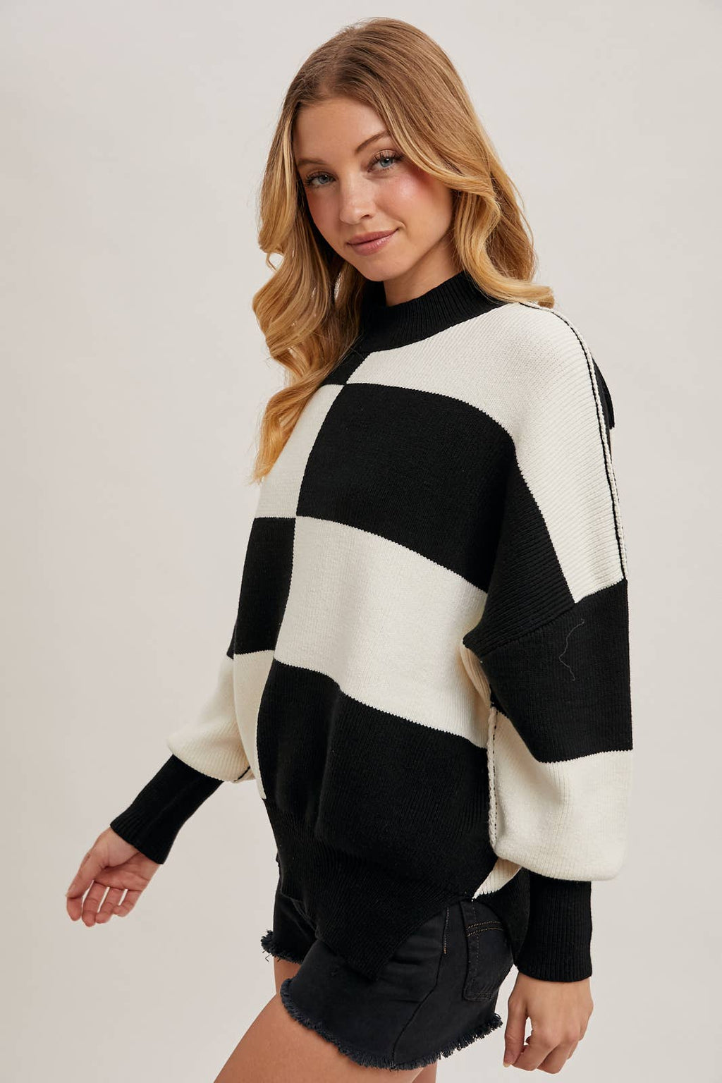 CHECKMATE KNIT SWEATER